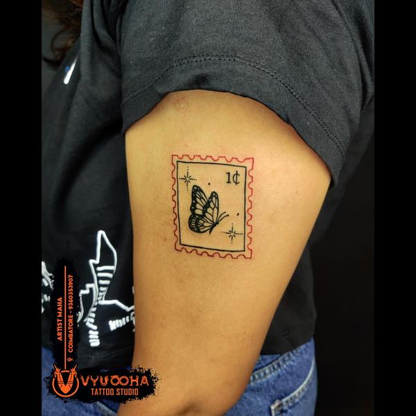 minimalist upper arm tattoo ra