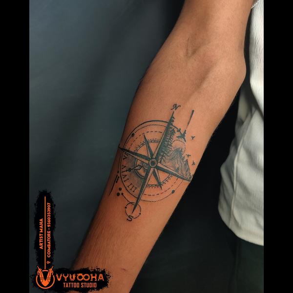 adventure inspired forearm tat