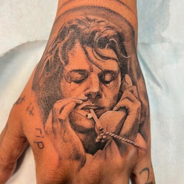 realistic face portrait tattoo