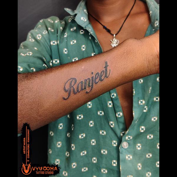 bold script tattoo design rath