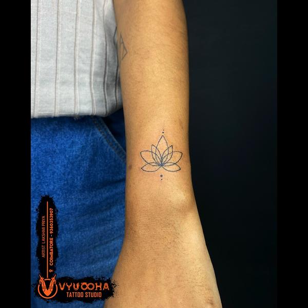 Minimal Lotus Tattoo on Wrist