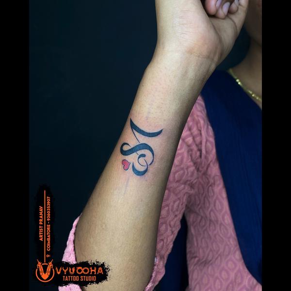 Elegant Tamil Letter 'M' Tatto