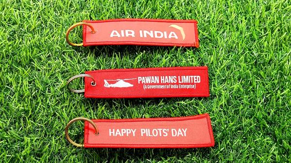 Airlines Fabric Keychain – Premium Aviation Tag by Asia Enterprises Elevate your everyday style with the Airlines Fabric Keychain from Asia Enterprises – a must-have accessory for aviation lovers, travel enthusiasts, and airline professionals. Designed for durability and flair, this high-quality embroidered fabric keychain makes a bold statement while keeping your keys, luggage, or backpack easily identifiable. Crafted from durable, tear-resistant polyester fabric, this aviation keychain tag is both lightweight and long-lasting. The high-quality embroidery features crisp, vibrant airline logos or custom text – perfect for pilots, flight crew, frequent travelers, and collectors of aviation memorabilia. The stainless steel keyring ensures secure attachment to your keys, zipper, or bag. Known as “Remove Before Flight keychains” in the aviation world, these stylish tags are not just trendy – they’re practical. Use them as luggage tags, key tags, or travel identifiers to spot your belongings instantly at busy airports, train stations, or on the go. Asia Enterprises specializes in custom manufacturing of aviation and travel accessories, offering a range of fabric keychains with embroidered airline names, airport codes, or personalized branding. Ideal for corporate gifting, promotional giveaways, airline staff uniforms, or travel retail stores, we offer competitive bulk pricing with fast delivery across global markets. Key Features: Durable polyester fabric with high-quality embroidery Classic aviation design: 'Remove Before Flight' or custom logos/text Rust-resistant metal keyring for secure attachment Lightweight, soft, and travel-friendly Great for pilots, flight attendants, travel lovers, and aviation collectors Available in bulk with full customization options Top Search Keywords: airlines fabric keychain, aviation keychain tag, remove before flight keychain, embroidered keychain, pilot keychain, aviation fabric tag, custom airline keychain, airline crew gift, flight keychain, travel keychain, airport souvenir, Asia Enterprises aviation tag, luggage key tag, aviation merchandise, flight attendant accessories Asia Enterprises is a trusted name in aviation merchandise and travel gear, offering premium products with global shipping and custom branding services. Whether you're outfitting an airline crew, promoting a travel business, or expanding your gift shop inventory, our fabric airline keychains deliver style, durability, and visibility. Order yours today or inquire about wholesale options and custom designs!