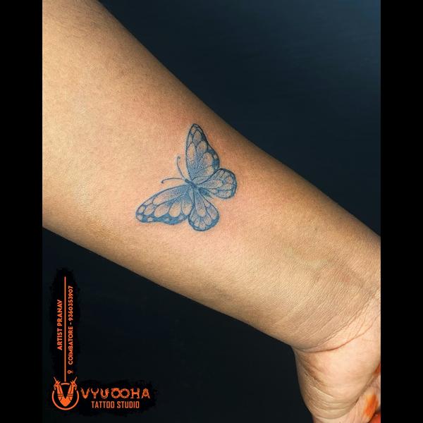 Blue Butterfly Wrist Tattoo –