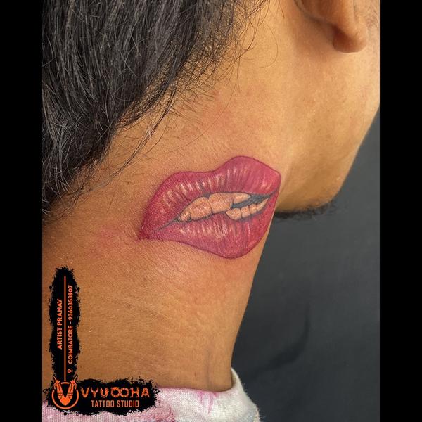 Realistic Lip Bite Tattoo on N