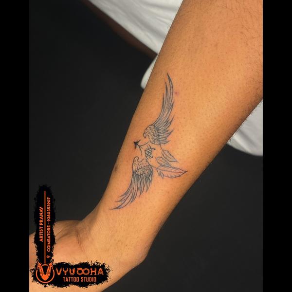 peace and freedom bird tattoos