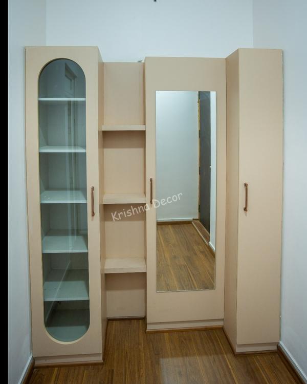 Coimbatore Wardrobe design with Glass Krishna dec
