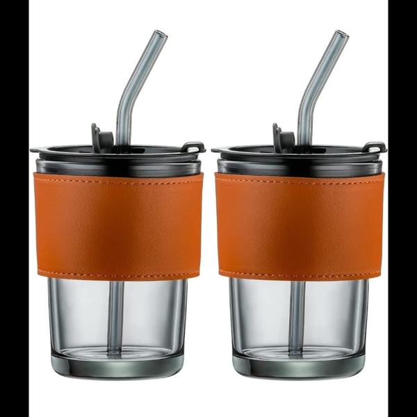 This is a set of glass tumblers with lids, straws,