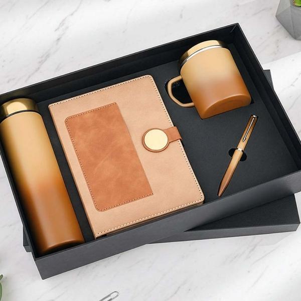 It typically includes a diary, a pen, an insulated