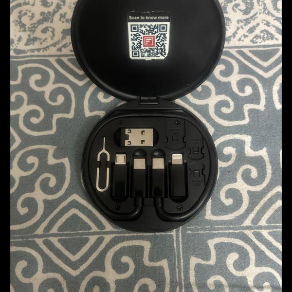 It includes a primary USB-C cable and adapters for