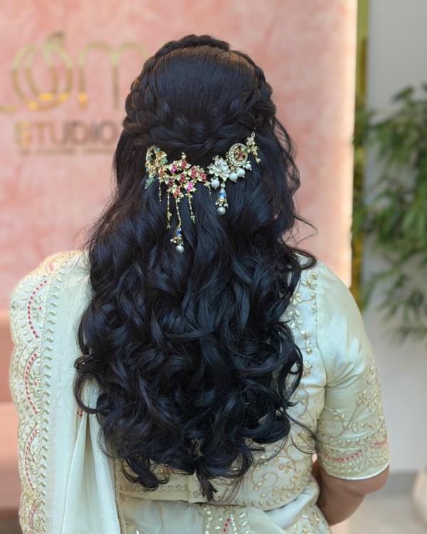 Royal jewel piece adorned hairstyle with