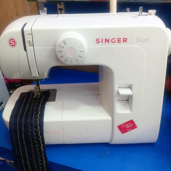 6 in-built stitches,70 w power