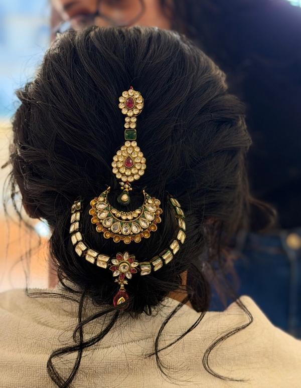 Timeless bun look paired with stunning t