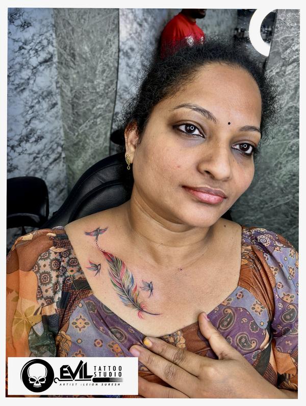 ✨ Elegant Feather Tattoo with 