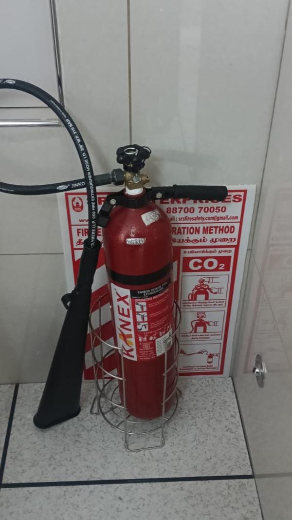 CO₂ type fire extinguisher installed — ideal for e