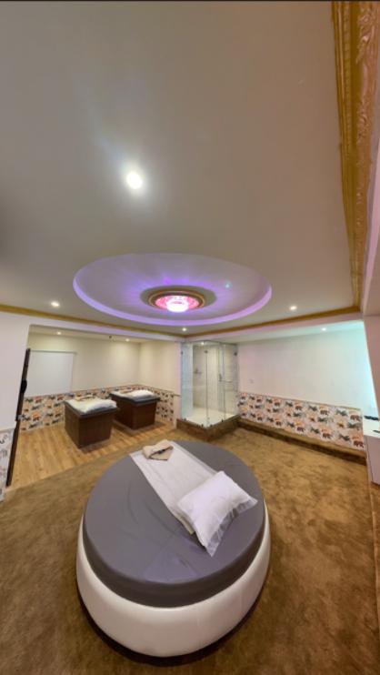 Step into our premium spa room featuring