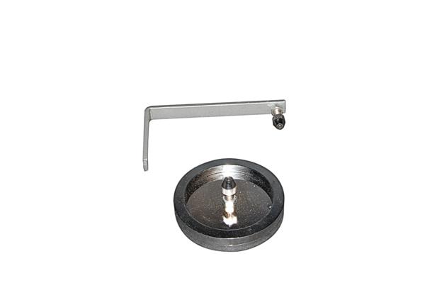 A torsion pendulum is a device in which a disc or 