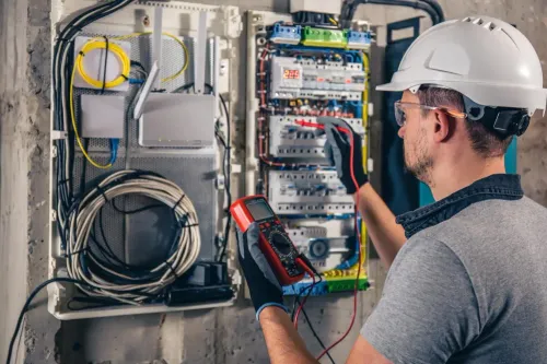 Electrical work in a commercial or industrial faci