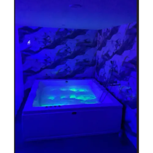 Relax in a premium jacuzzi spa room at Z
