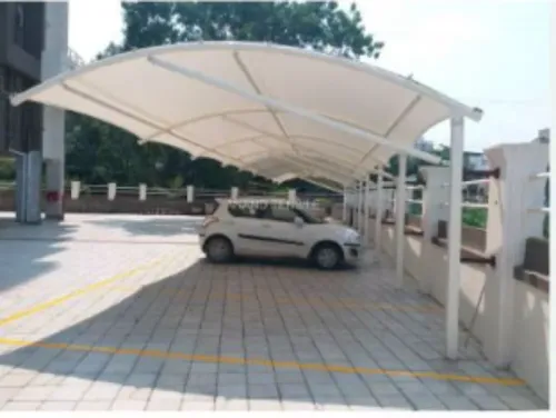An uncovered parking area exposes vehicles to inte