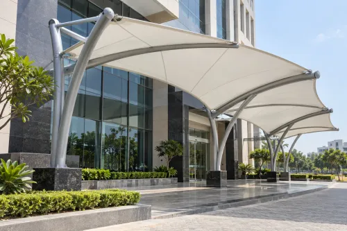 An entrance canopy is often on