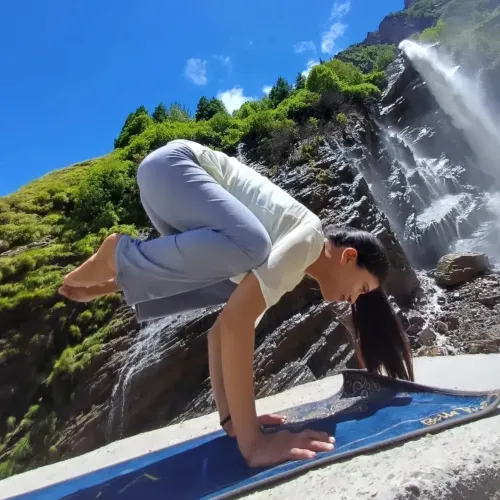 Female Yoga Teacher at Home in